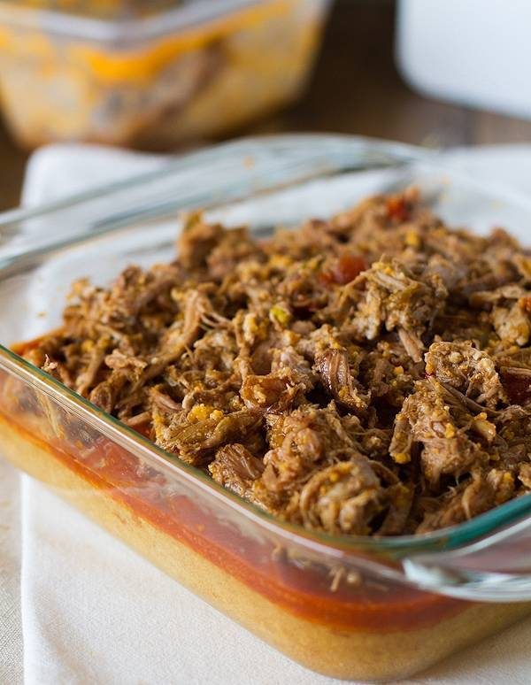 Chicken Tamale Pie with carnitas on top.