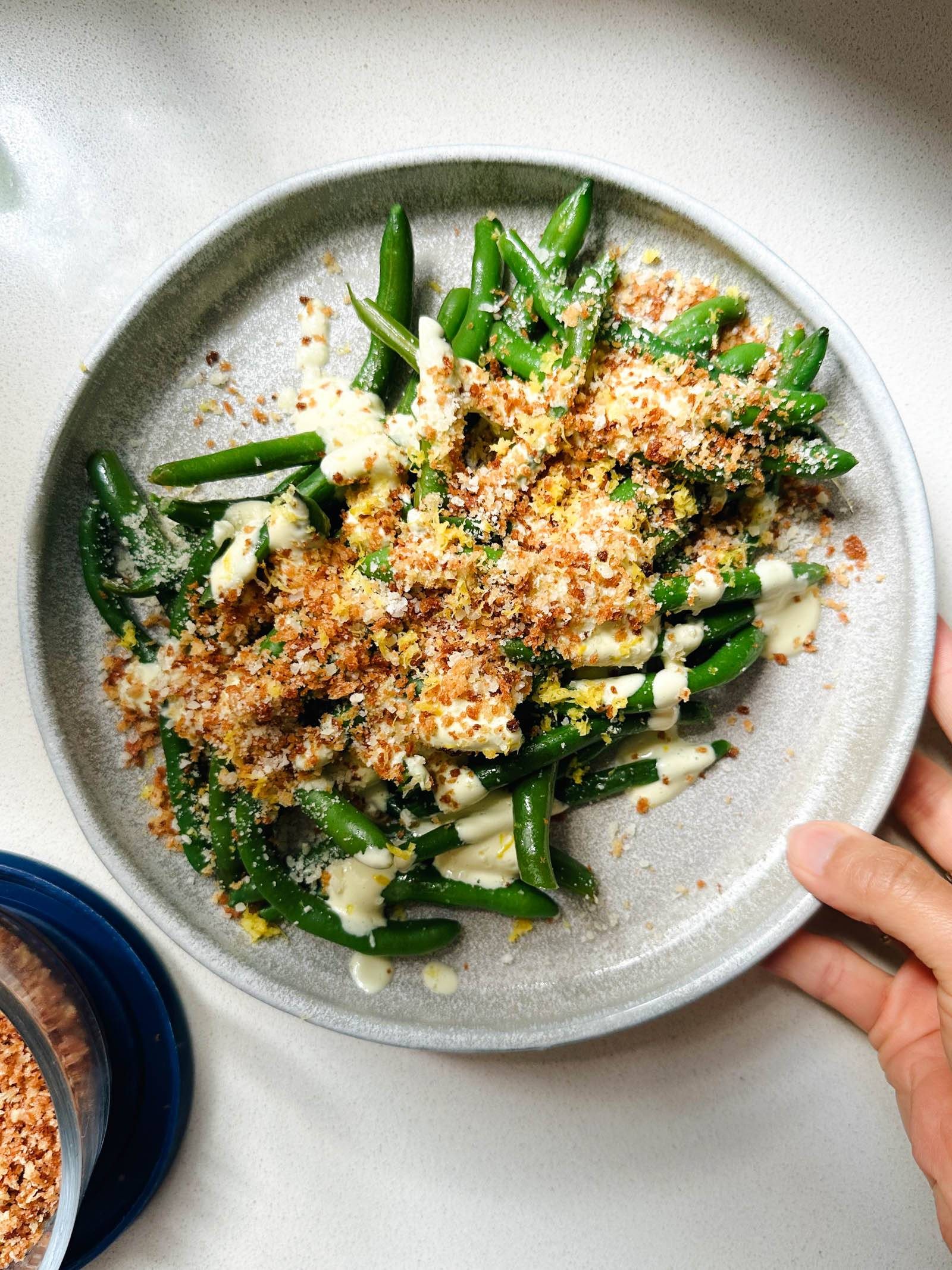 Green beans with avocado caesar dressing.