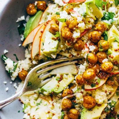 Detox Cauliflower Salad in bowl with fork.